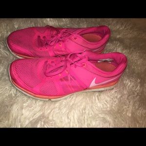 Hot pink Nike sneakers